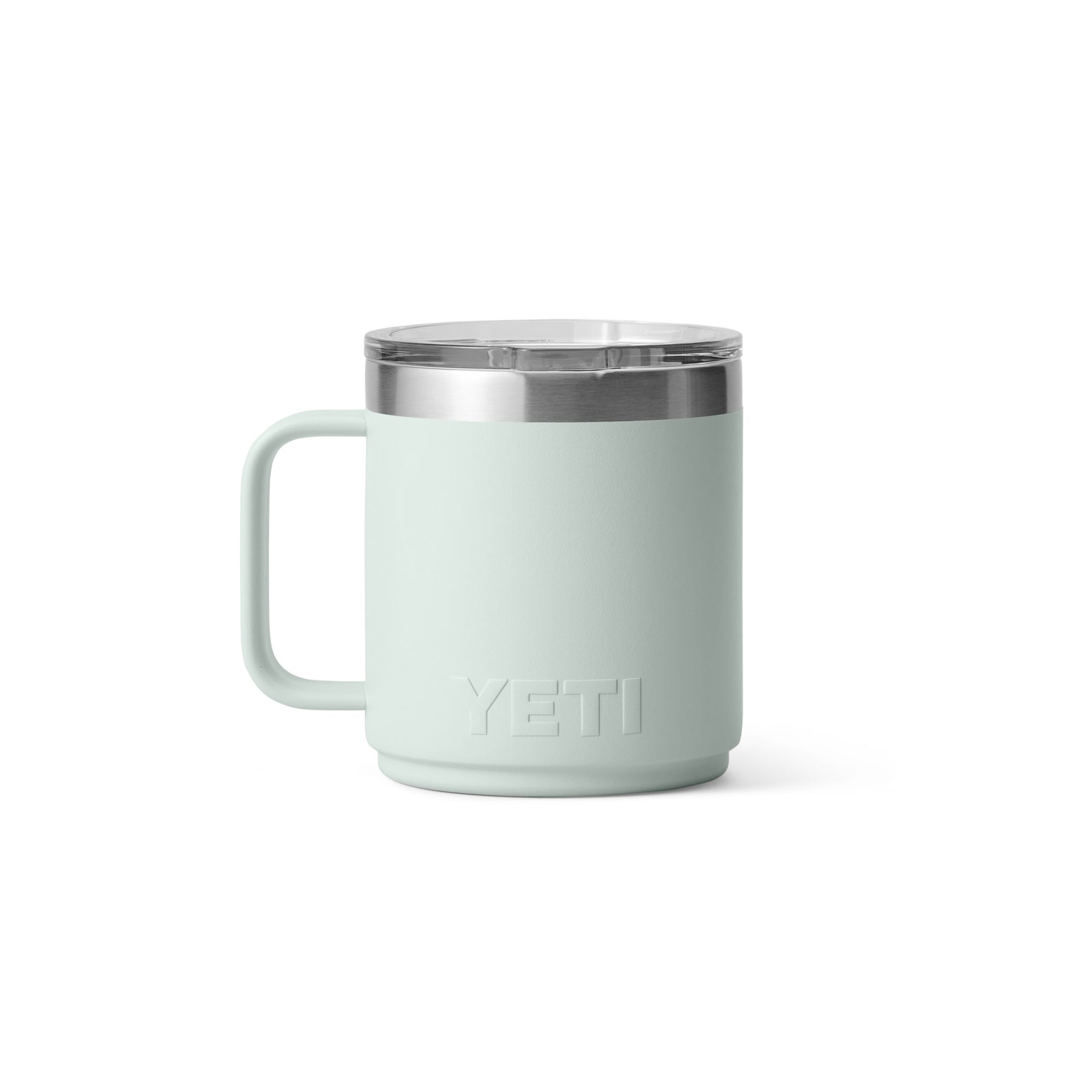 Die hellgrüne YETI® Tasse Rambler 10 Oz - Ridgeline mit Henkel und durchsichtigem Deckel mit Edelstahlrand verfügt über eine doppelwandige Vakuumisolierung, abgebildet auf einem schlichten weißen Hintergrund.