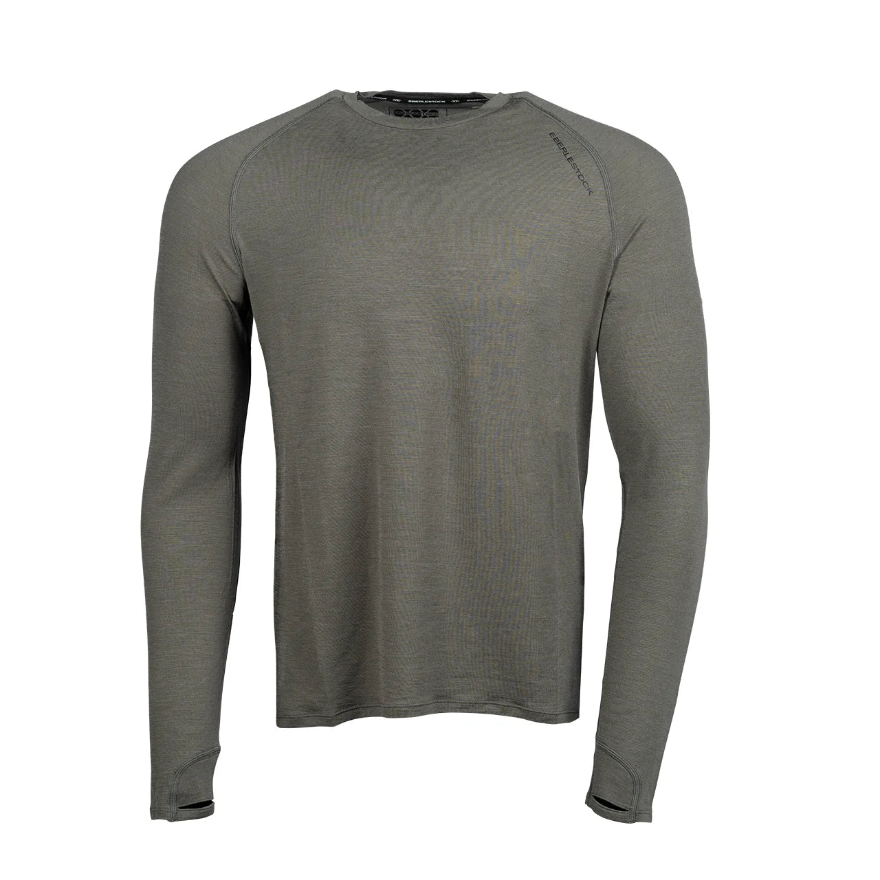 Das EBERLESTOCK Lochsa Merino Long Sleeve in Slate ist ein schlichtes Shirt mit Rundhalsausschnitt, langen Ärmeln und Daumenlöchern - perfekt als Baselayer für zusätzlichen Komfort und Wärme, hier auf weißem Grund.