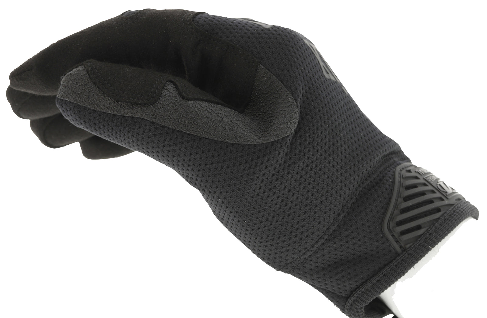 Eine Person trägt den MECHANIX Mechanix Handschuh The Original Gen3 - Covert, einen schwarzen, strukturierten Vollfingerhandschuh mit verstärkten Bereichen und einem gummiartigen Schutzteil im Bereich des Handgelenks; die Finger sind leicht gebogen, die Handfläche zeigt nach unten.