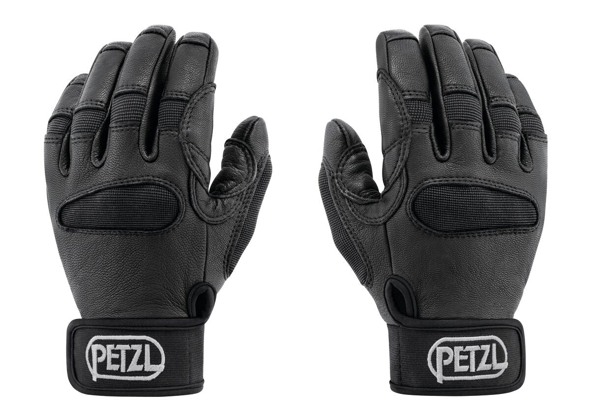 Ein Paar schwarze PETZL Cordex Plus Handschuhe mit verstärkten Knöcheln und Handflächen, mit verstellbaren Handgelenksschlaufen und PETZL-Logo. Abgebildet mit den Handflächen nach vorne auf weißem Hintergrund.