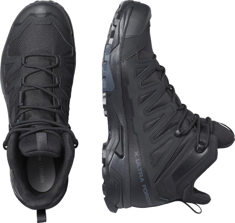 Der Salomon X ULTRA FORCES MID GTX - Black von SALOMON FORCES wird aus zwei Blickwinkeln gezeigt: eine Draufsicht mit gebundenen Schnürsenkeln und eine Seitenansicht mit der Sohle und dem Ultra Force Label.