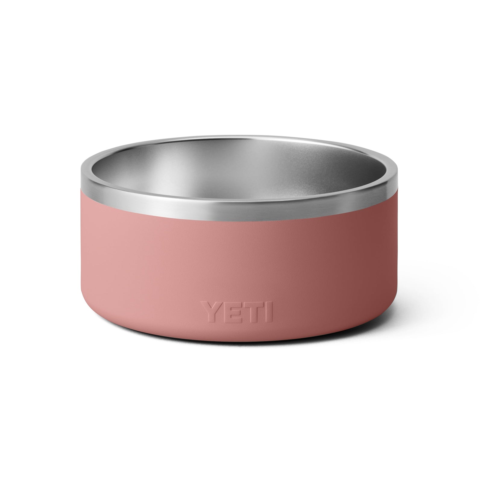 Ein YETI® Hundenapf Boomer™ 8 in Sandstone Pink mit einem Innenleben aus Edelstahl und geprägtem YETI-Logo steht auf einem schlichten weißen Hintergrund.