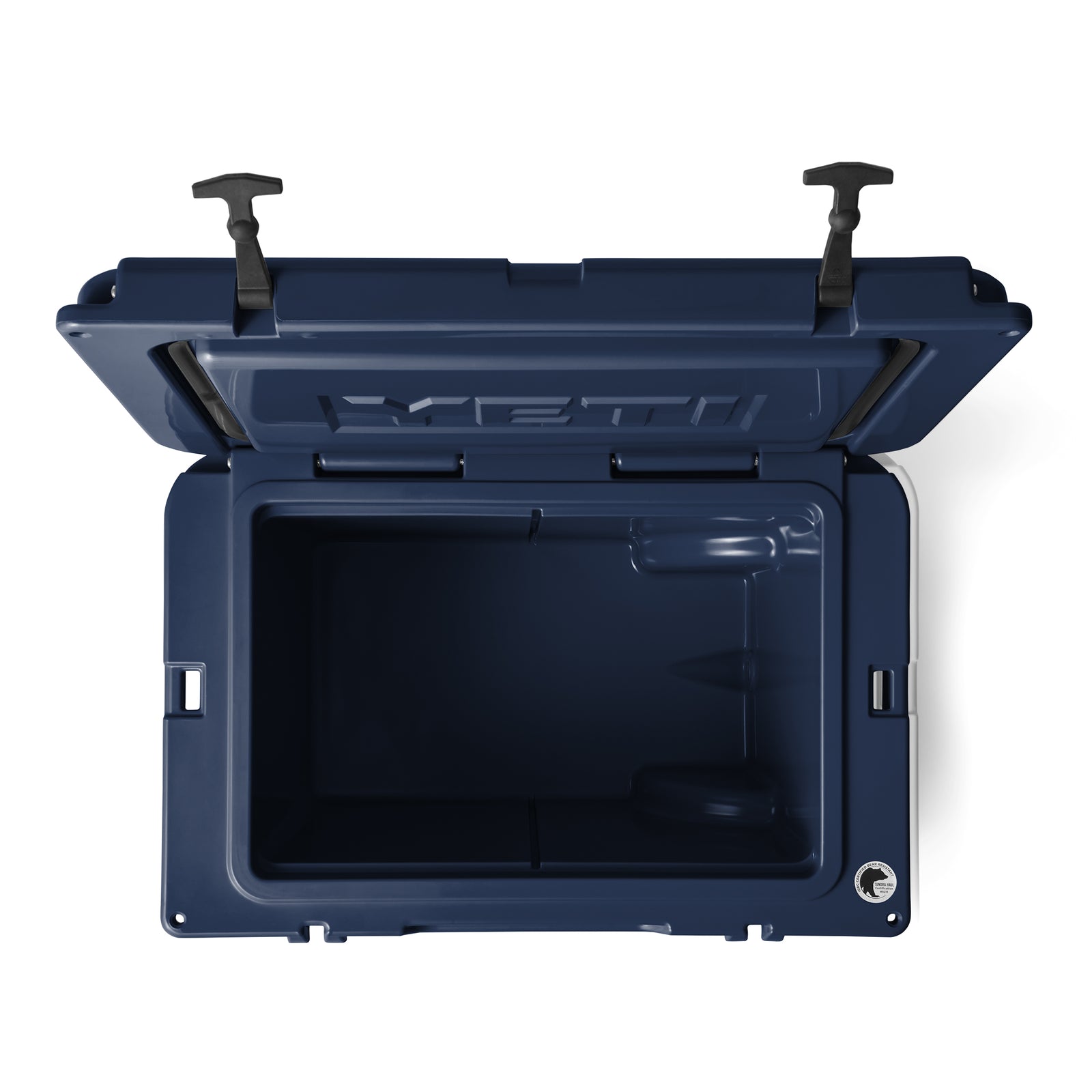 Draufsicht auf eine geöffnete, leere YETI® Kühlbox Tundra Haul - Navy mit erhöhtem Deckel und sichtbaren schwarzen Griffen. Der geräumige, geformte Innenraum verfügt über Fächer und ein Abflussloch - ideal für Ihre Outdoor-Kühlbox von YETI.