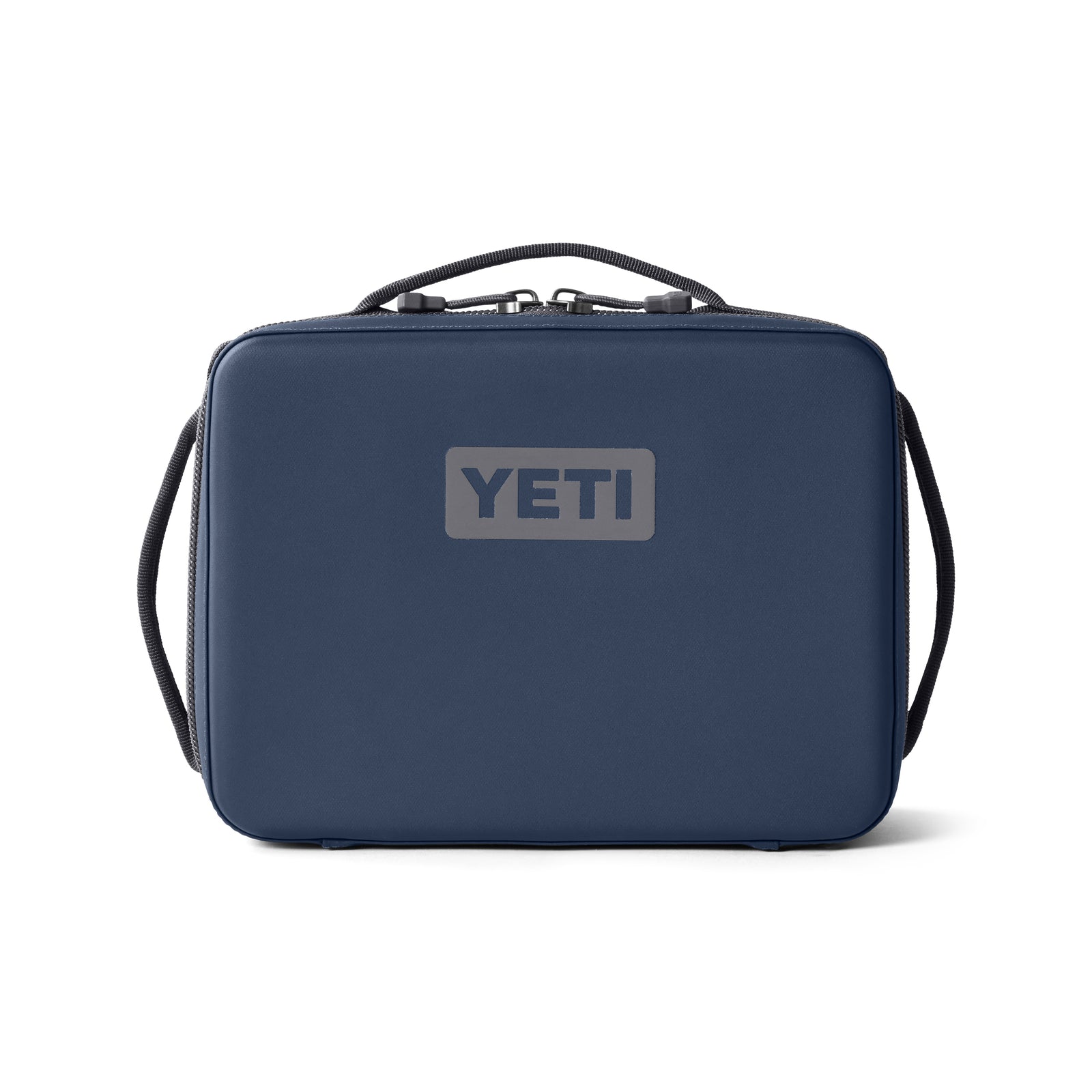 Die YETI® Kühltasche Daytrip Lunch Box 5L in Navy ist eine rechteckige Lunchbox mit Tragegriff, Reißverschluss und grauem YETI-Logo - ideal, um Ihre Mahlzeiten unterwegs frisch zu halten.