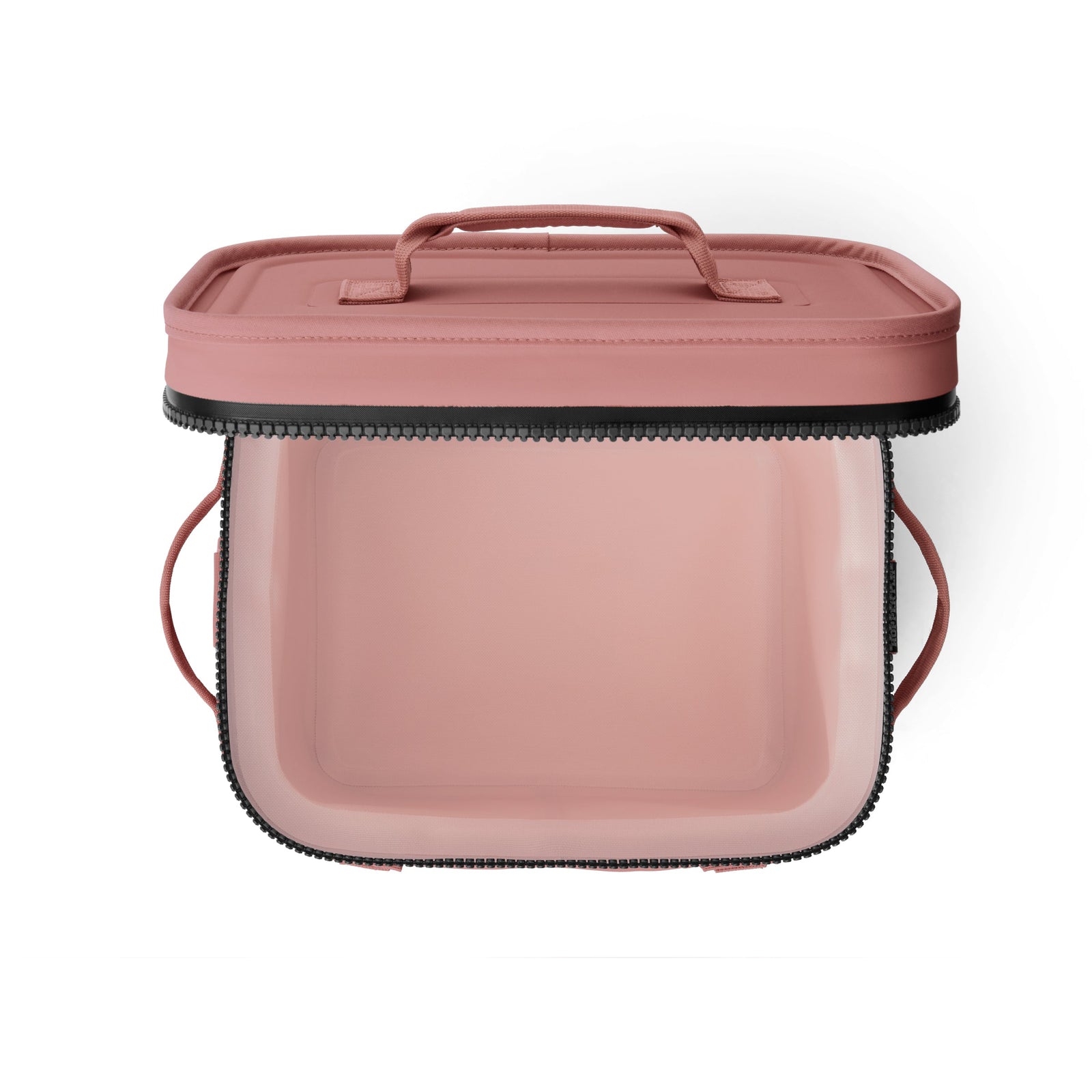 Die YETI® Kühltasche Hopper Flip® 12 in Sandstone Pink ist eine rechteckige, weiche Kühltasche mit einem Deckel mit Reißverschluss, einem Griff, transparenten Seiten und abgerundeten Kanten, abgebildet auf weißem Hintergrund.