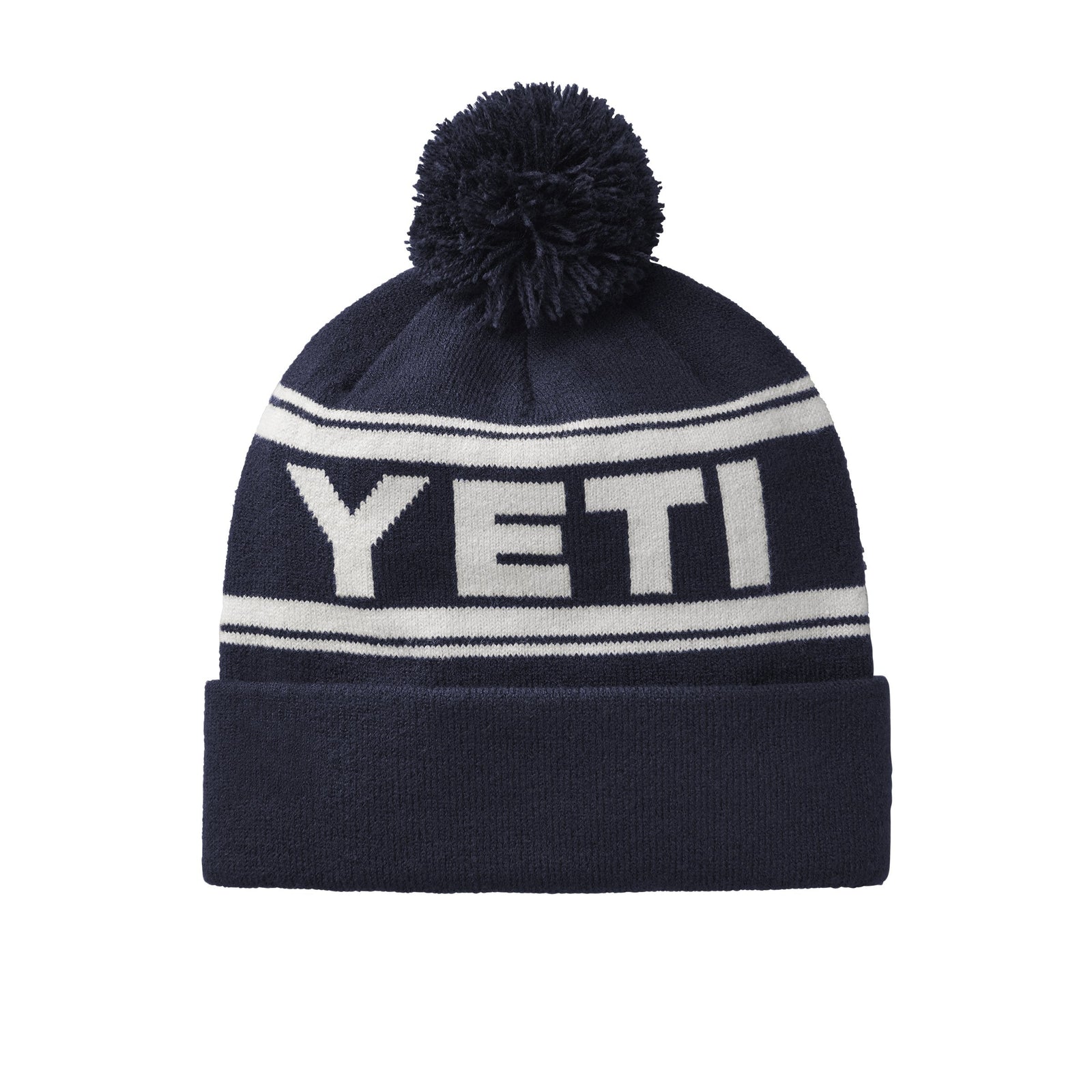 Die YETI® Logo Retro Knit Beanie ist eine navyfarbene Bommelmütze mit auffälligen weißen Streifen und dem Schriftzug "YETI" in großen Buchstaben - zeigen Sie Ihren Stil mit dieser klassischen YETI Mütze.