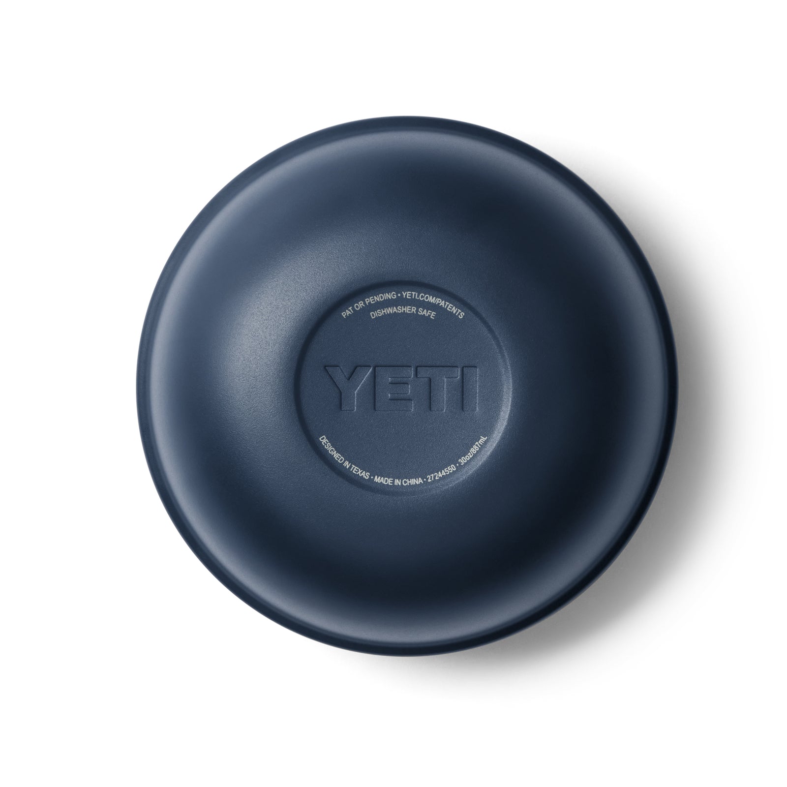 Eine runde, marineblaue YETI® Rambler Bowl Small mit doppelwandiger Vakuumisolierung und dem eingeprägten YETI-Logo in der Mitte, von oben gesehen. Das glatte, schlichte Design erinnert an einen Deckel oder Untersetzer.