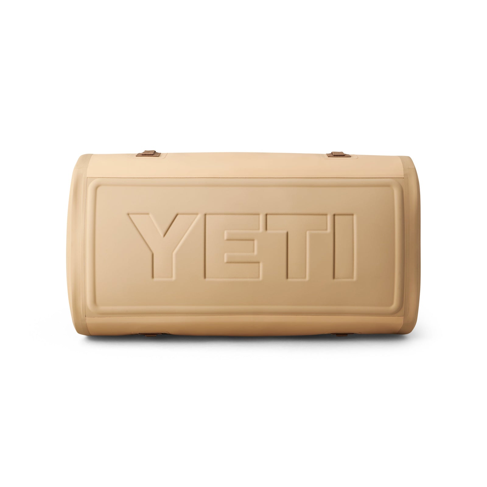 Eine hellbraune, rechteckige YETI® Reisetasche Panga 75 ist mit der Vorderseite nach vorne auf weißem Hintergrund abgebildet und trägt das YETI-Branding - ideal für Outdoor-Abenteuer.