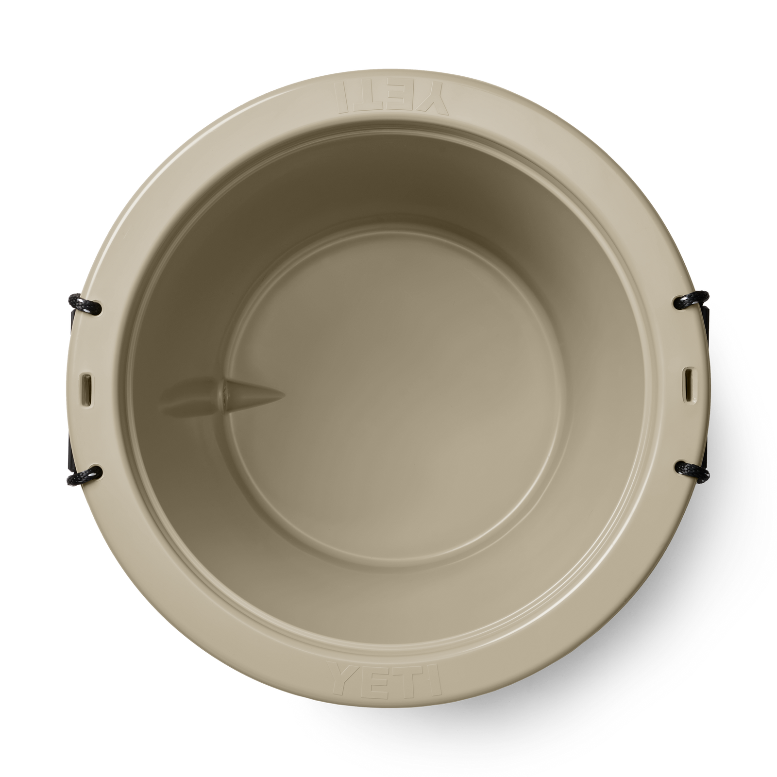Draufsicht auf den YETI® Tank 85 Insulated Ice Bucket in Tan mit glattem Innenraum, schwarzen Seilgriffen an den Seiten und dem geprägten YETI-Logo am Rand.