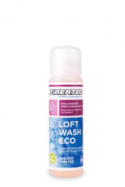 Die 100-ml-Flasche FIBERTEC Fibertec Loft Wash Eco mit weißer Kappe und rosa-blauem Etikett zeigt Produktname und Öko-Angaben in Deutsch und Englisch und ist für die Reinigung von Synthetikfüllungen geeignet (Synthetikfüllung reinigen).
