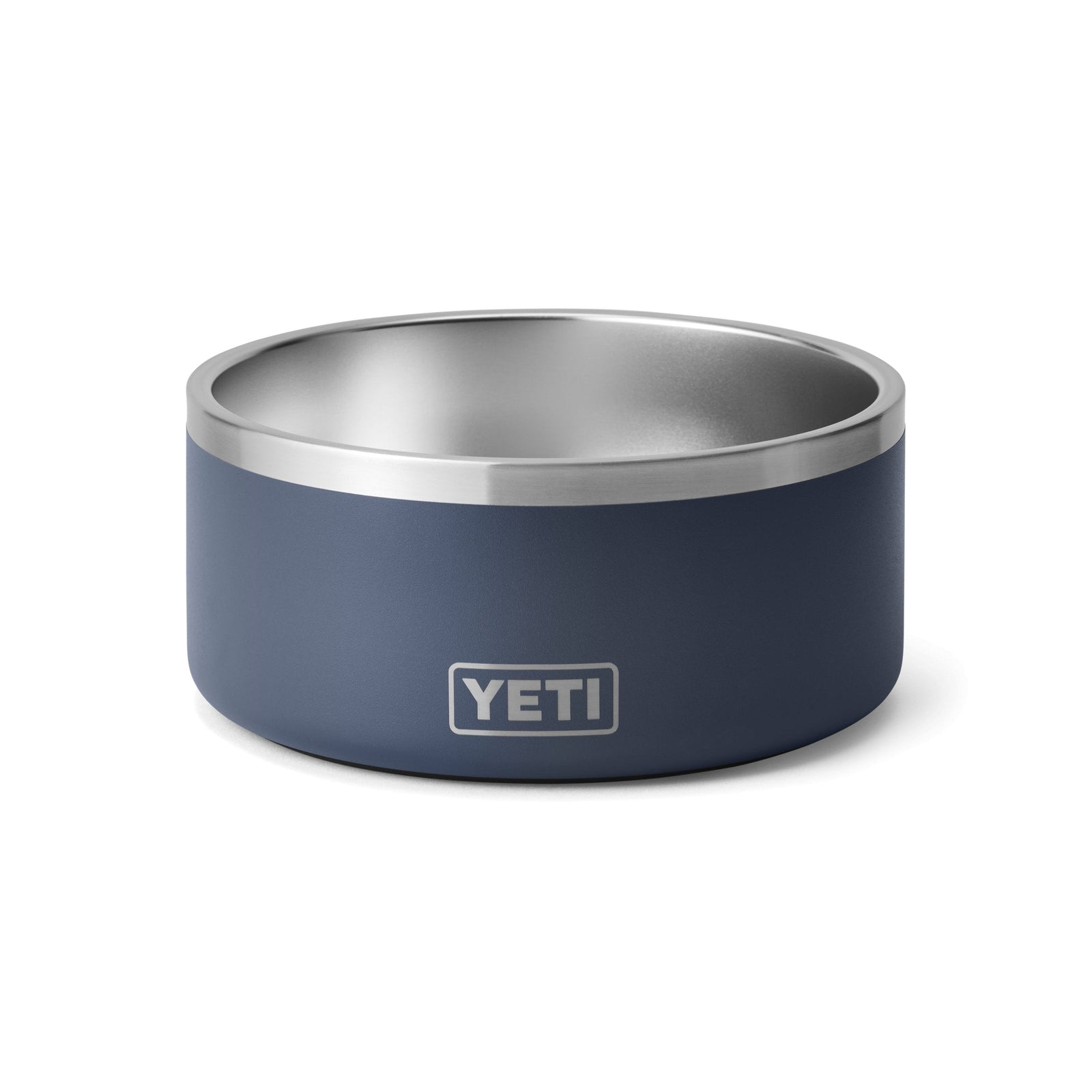 Der YETI® Hundenapf Boomer™ 8 - Navy ist ein dunkelblauer Hundenapf aus Edelstahl mit silbernem Rand, der auf weißem Hintergrund abgebildet ist und das YETI-Logo an der Seite trägt.