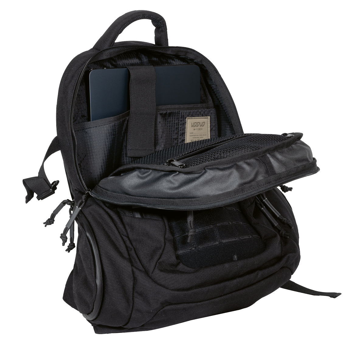Der KROKO Kroko Rucksack in schwarz verfügt über ein offenes Hauptfach mit gesichertem Laptop, mehrere Innentaschen, darunter eine Netztasche mit Reißverschluss auf der Klappe, aus robustem Cordura 1000D und ist MOLLE kompatibel für Vielseitigkeit.