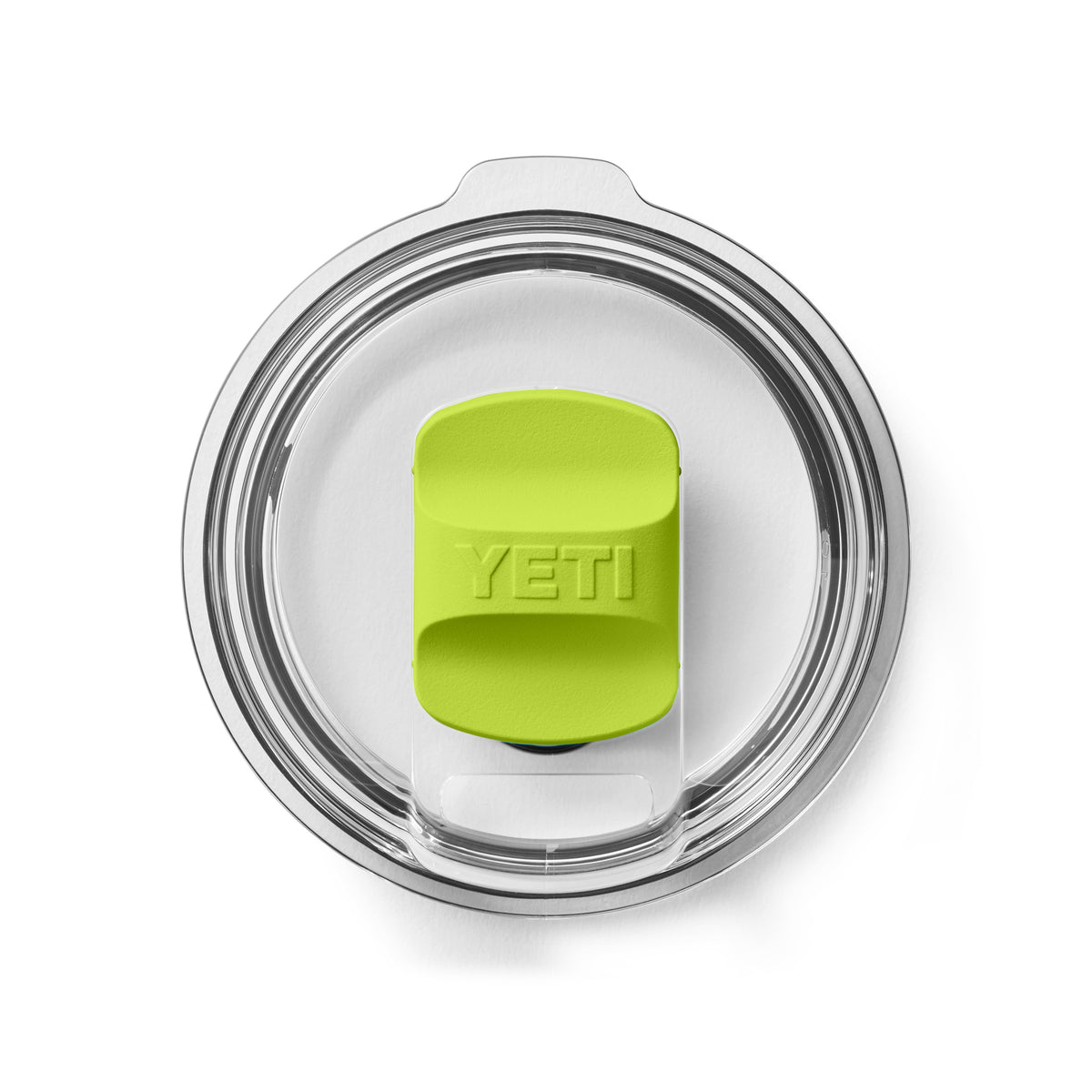 Ein durchsichtiger, runder YETI® Magslider Pack - Venom Deckel von YETI zeigt einen leuchtend grünen, rechteckigen Schieber in der Mitte, von oben betrachtet auf weißem Hintergrund.