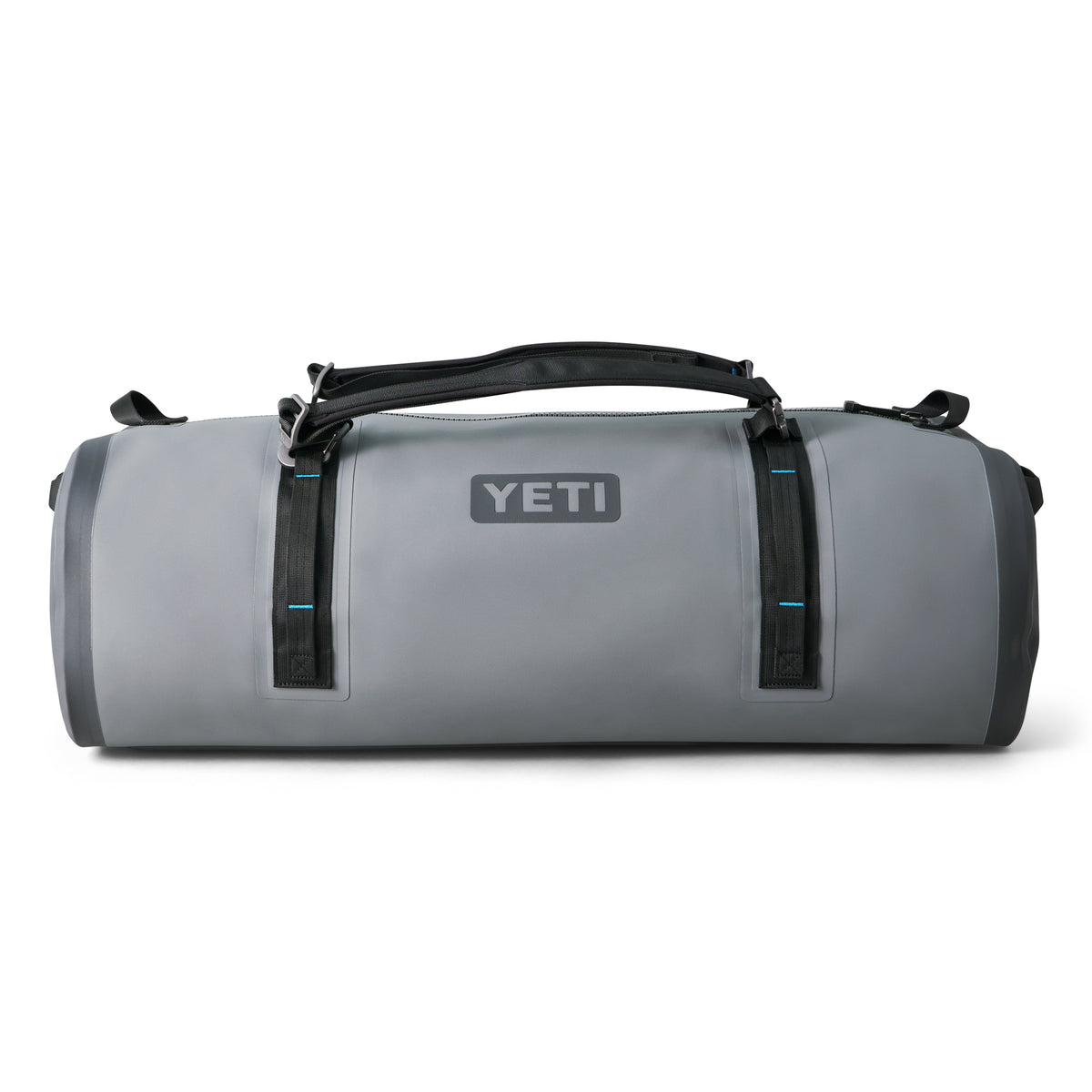 Die YETI® Reisetasche Panga 100 in Storm Grey steht auf einem weißen Hintergrund, mit schwarzen Griffen, Riemen und einem auffälligen YETI-Logo.
