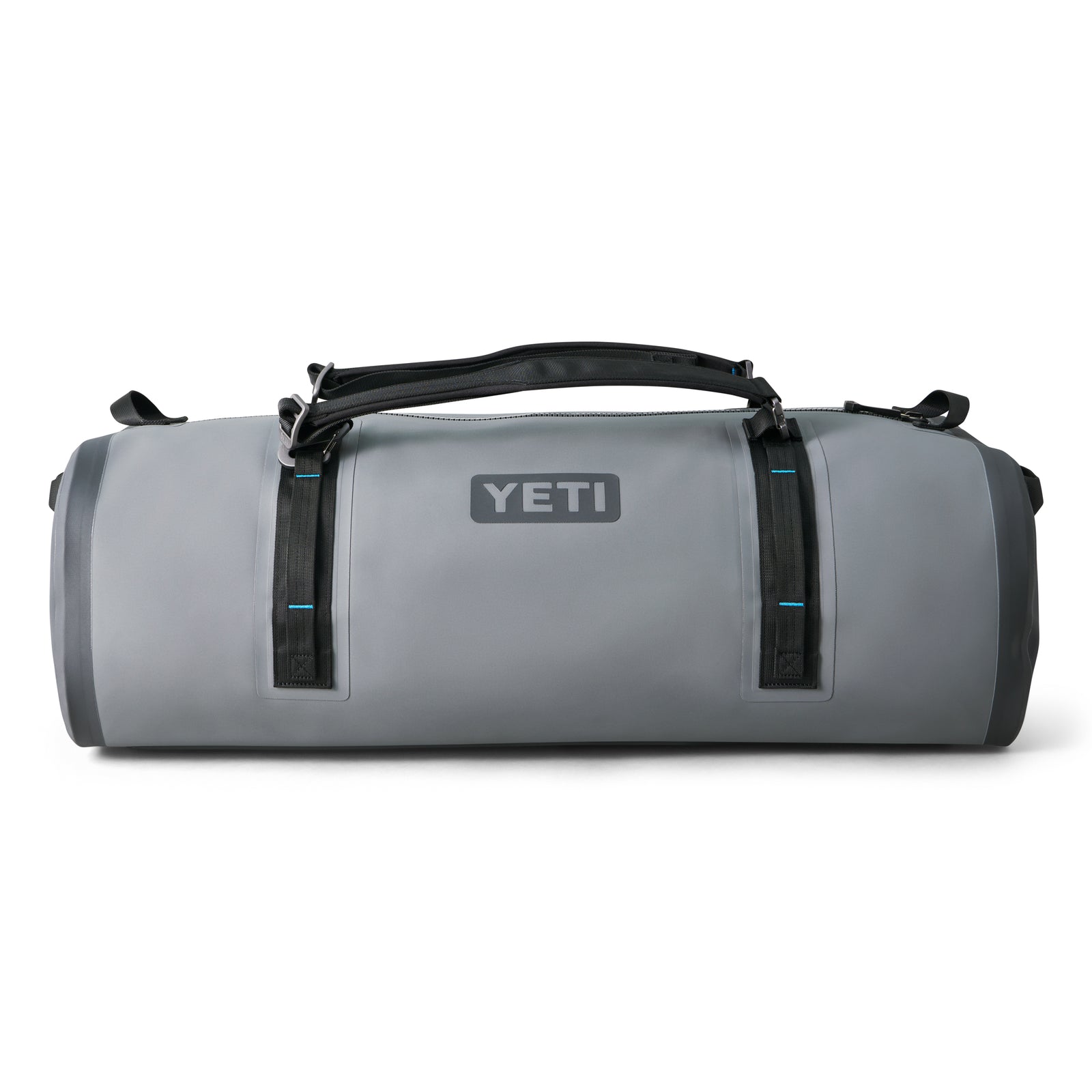 Die YETI® Reisetasche Panga 100 in Storm Grey steht auf einem weißen Hintergrund, mit schwarzen Griffen, Riemen und einem auffälligen YETI-Logo.