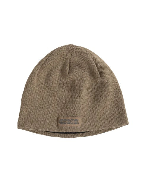 Die Eberlestock North Fork Merino Beanie von EBERLESTOCK ist eine braune Strickmütze aus Merinowolle mit dezentem Logoaufnäher - ideal als Outdoor-Kopfbedeckung.