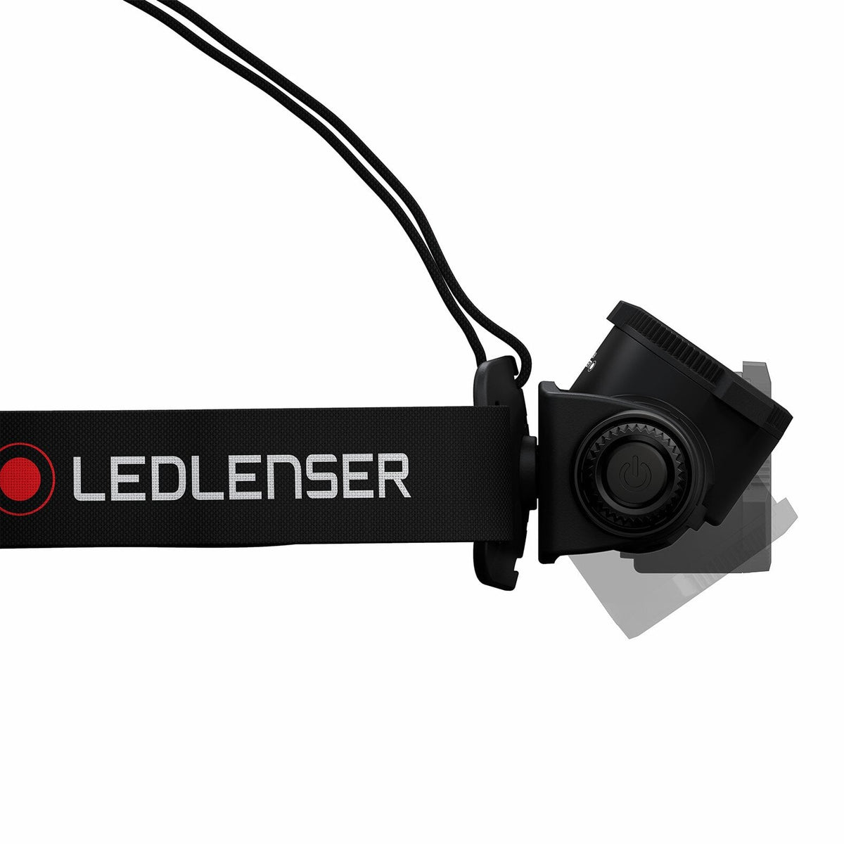 Seitenansicht der LEDLENSER Stirnlampe H7R Core in Schwarz mit verstellbarem "LEDLENSER"-Riemen. Sie zeigt den Einschaltknopf, die Neigefunktion und das Advanced Focus System für individuell anpassbares Licht.