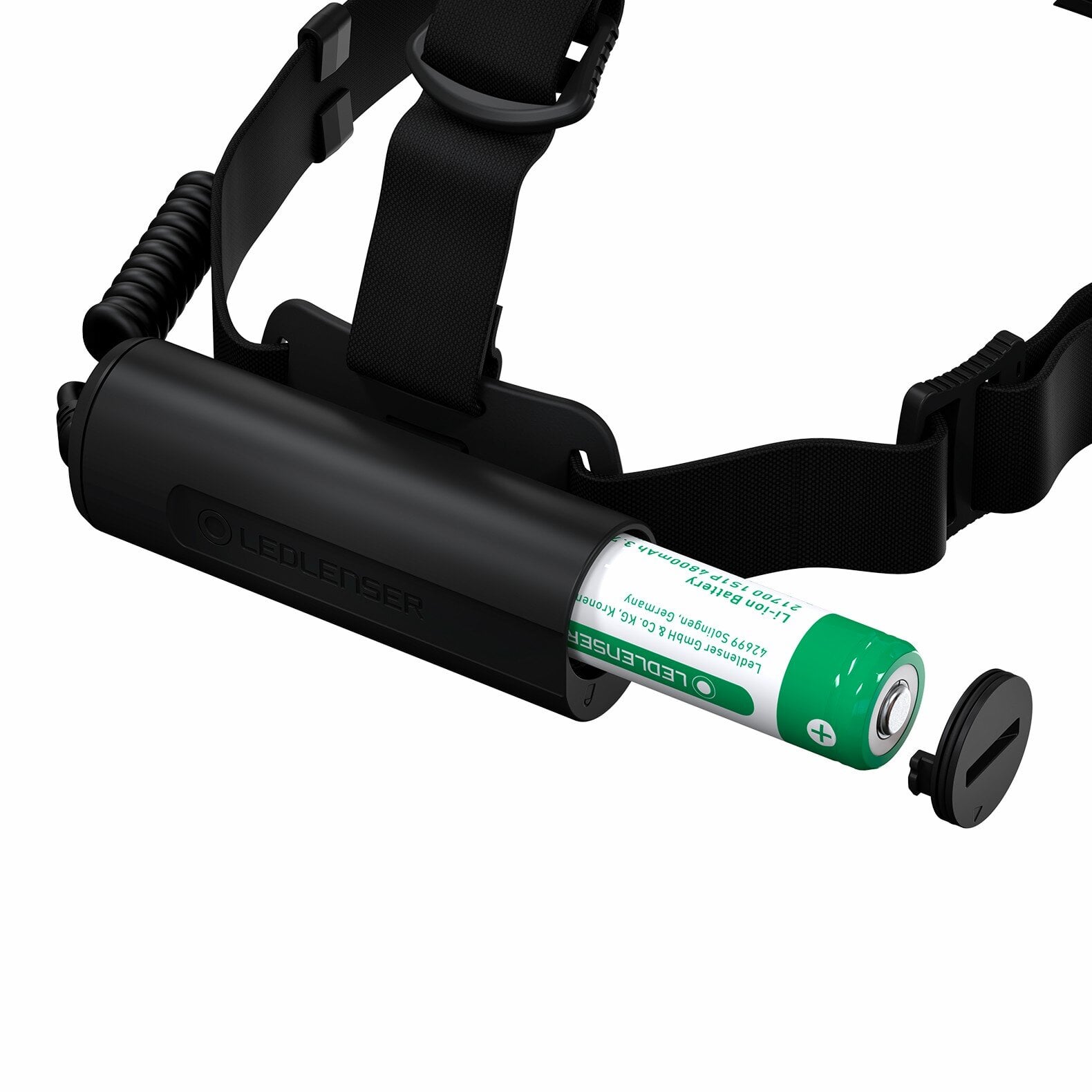 Die LEDLENSER Stirnlampe H7R Core wird mit geöffnetem Batteriefach gezeigt, in das ein grüner 21700 Li-Ionen-Akku mit 4800 mAh eingelegt ist. Der schwarze verstellbare Riemen und das Advanced Focus System sind ebenfalls sichtbar.