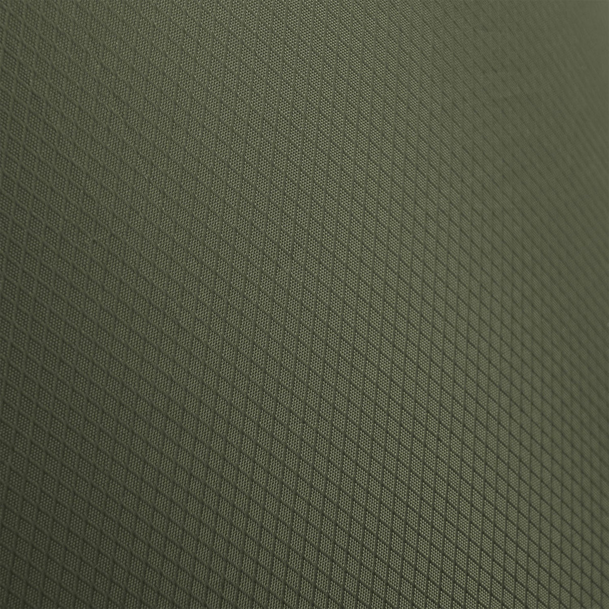Nahaufnahme des Highlander Puff Sack Inflation Drybag von HIGHLANDER FORCES. Die strukturierte, dunkelgrüne Oberfläche mit dem sich wiederholenden Rautengittermuster sorgt für ein geometrisches, netzartiges Aussehen.