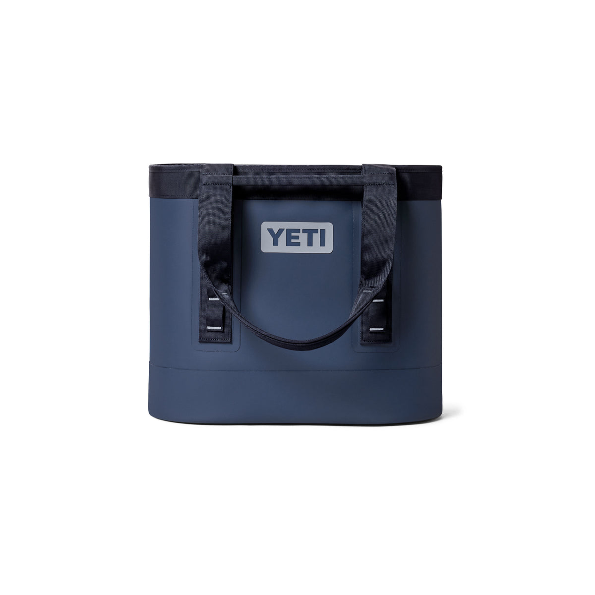 Die YETI® Tragetasche Camino® Carryall 35 in der Farbe „Classic Navy“ – eine robuste Allzwecktasche mit schwarzen Tragegriffen und einem gut sichtbaren YETI-Logo auf der Vorderseite – ist vor einem weißen Hintergrund abgebildet.