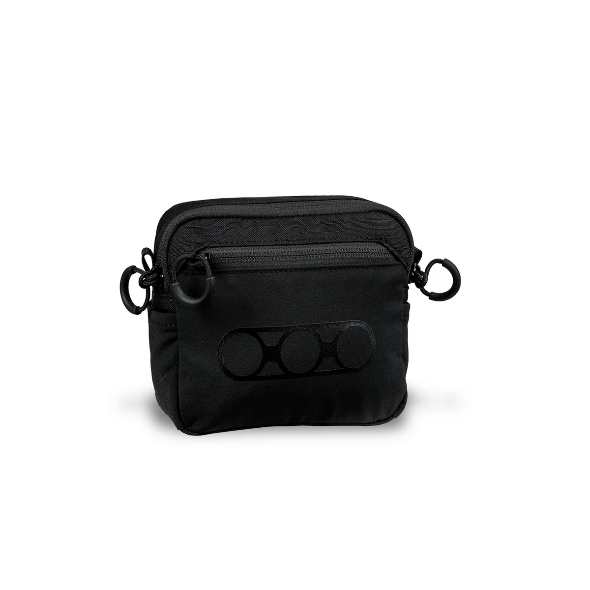 Die EBERLESTOCK General Purpose Pouch Small ist eine schwarze, rechteckige Crossbody-Tasche aus strapazierfähigem 500D Cordura-Nylon, mit einer Reißverschlusstasche auf der Vorderseite, seitlichen Ösen für einen Trageriemen und einem dezenten Kreismuster auf der Vorderseite.