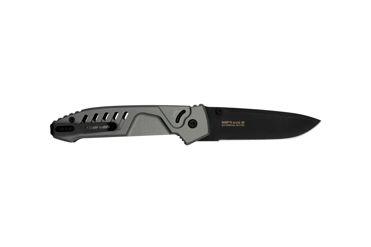 Das EXTREMA RATIO MF1 EVO D Tactical Grey ist ein schwarzes, klappbares Taschenmesser mit strukturiertem Metallgriff, ausgeschnittenen Schlitzen, Taschenclip und Böhler N690 Gravur auf der Klinge.