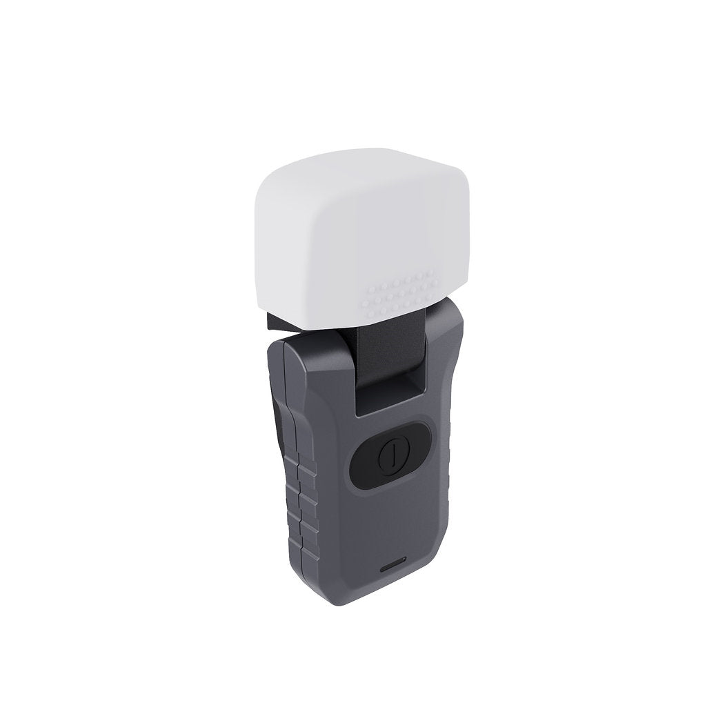 Die NORDRIDE Signalkappe & Diffusor zu Scout, Patrol & Paramedic Light ist ein kompaktes, handgeführtes Gerät in Schwarz und Grau mit zentralem Knopf und weißer Signalkappe - der strukturierte Griff und das minimalistische Design machen es perfekt für die Kombination mit Clipleuchten.