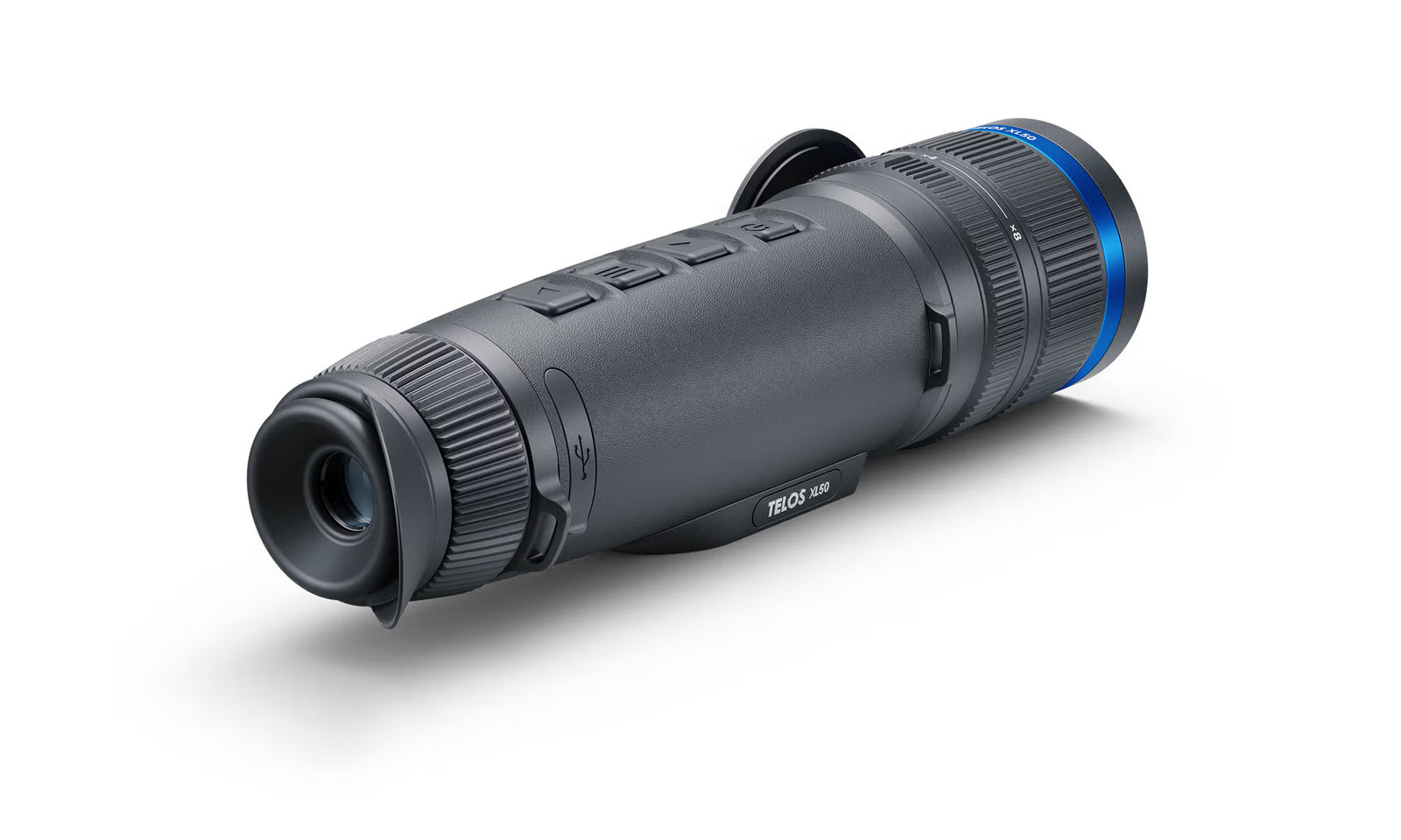 Das schwarze PULSAR Wärmebildgerät Telos XL50 mit strukturiertem Griff, Tasten auf der Oberseite und einem blauen TELŌS LRF-Ring in der Nähe des Objektivs ruht auf einer weißen Oberfläche - eine ideale Wahl für alle, die eine fortschrittliche Wärmebildkamera suchen.