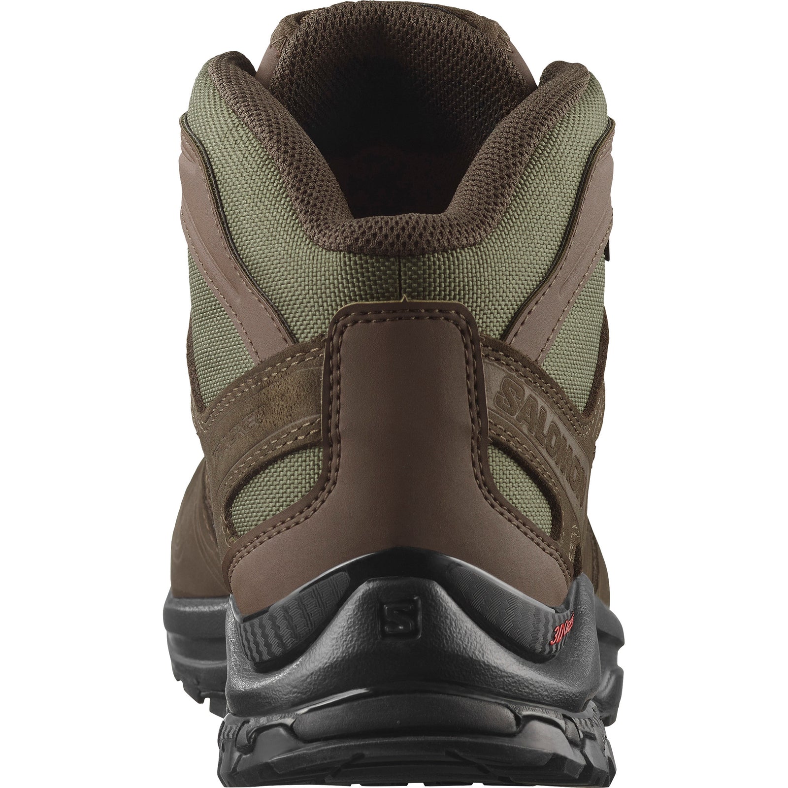 Eine Nahaufnahme der Rückseite des SALOMON TRACKER XA TRACKER GTX Wanderstiefels in Braun/Oliv/Schwarz zeigt sein robustes Design, den gepolsterten Kragen, die schwarze Sohle, das sichtbare Branding und das strapazierfähige Gore-Tex-Futter für wasserdichten Schutz.