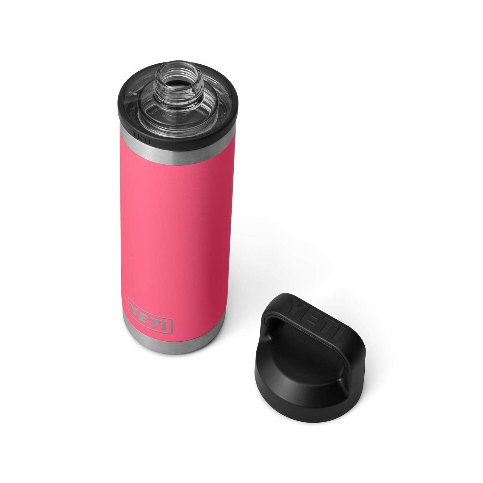Die YETI® Flasche Rambler 18 Oz in Tropical Pink mit Edelstahlrand und doppelwandiger Vakuumisolierung steht mit abgenommenem schwarzem Schraubdeckel auf weißem Hintergrund - spülmaschinenfest für einfache Reinigung.