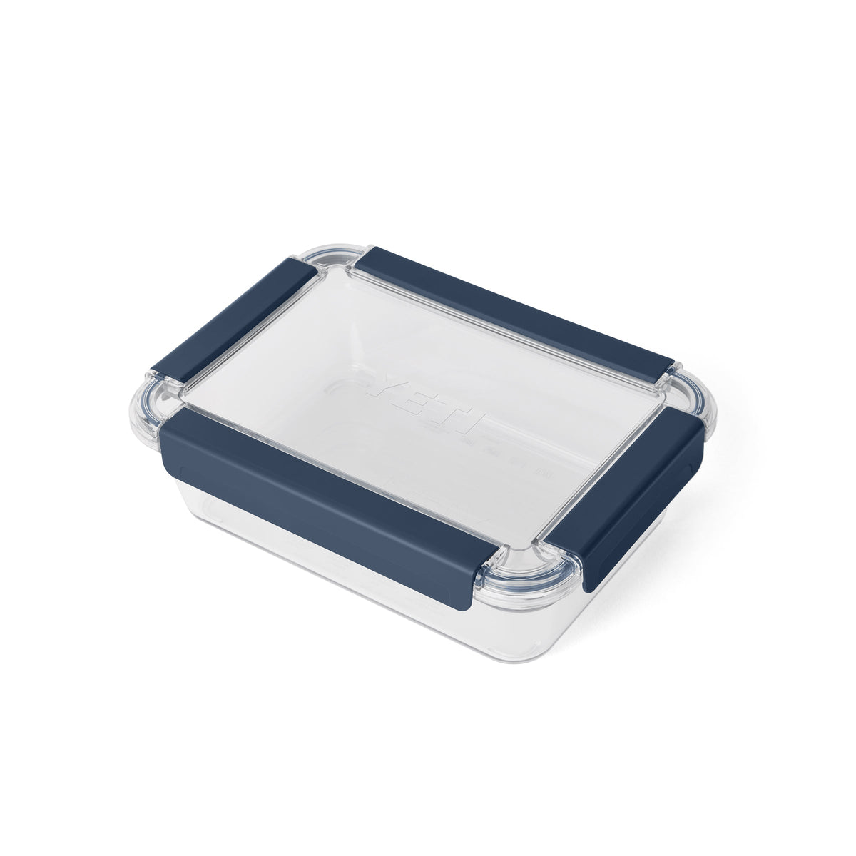 Die YETI® Food Storage Large ist eine rechteckige, BPA-freie Lebensmittelaufbewahrungsbox mit transparentem Deckel und vier dunkelblauen Verschlussclips - ideal für die Aufbewahrung von Lebensmitteln unterwegs.