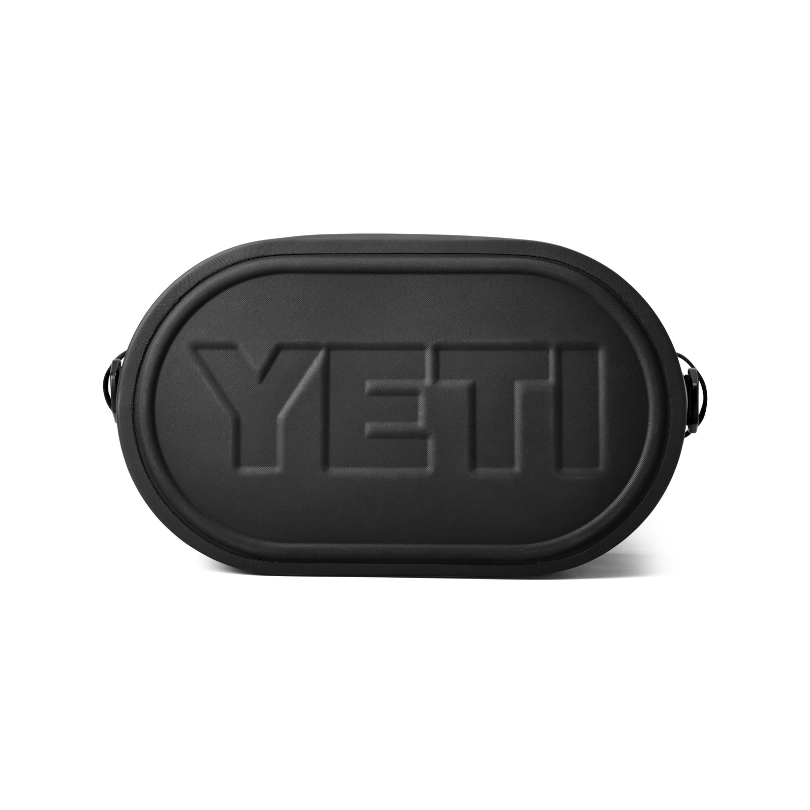 Ein schwarzer, ovaler Hartschalenkoffer mit "YETI"-Prägung auf der Vorderseite. Ihr schlankes Design und die zwei Gurtschlaufen machen sie perfekt für die Kombination mit Ihrer YETI® Hopper M30 Soft Cooler - Black oder zum Verstauen von wichtigen Dingen in Ihrer Kühltasche.