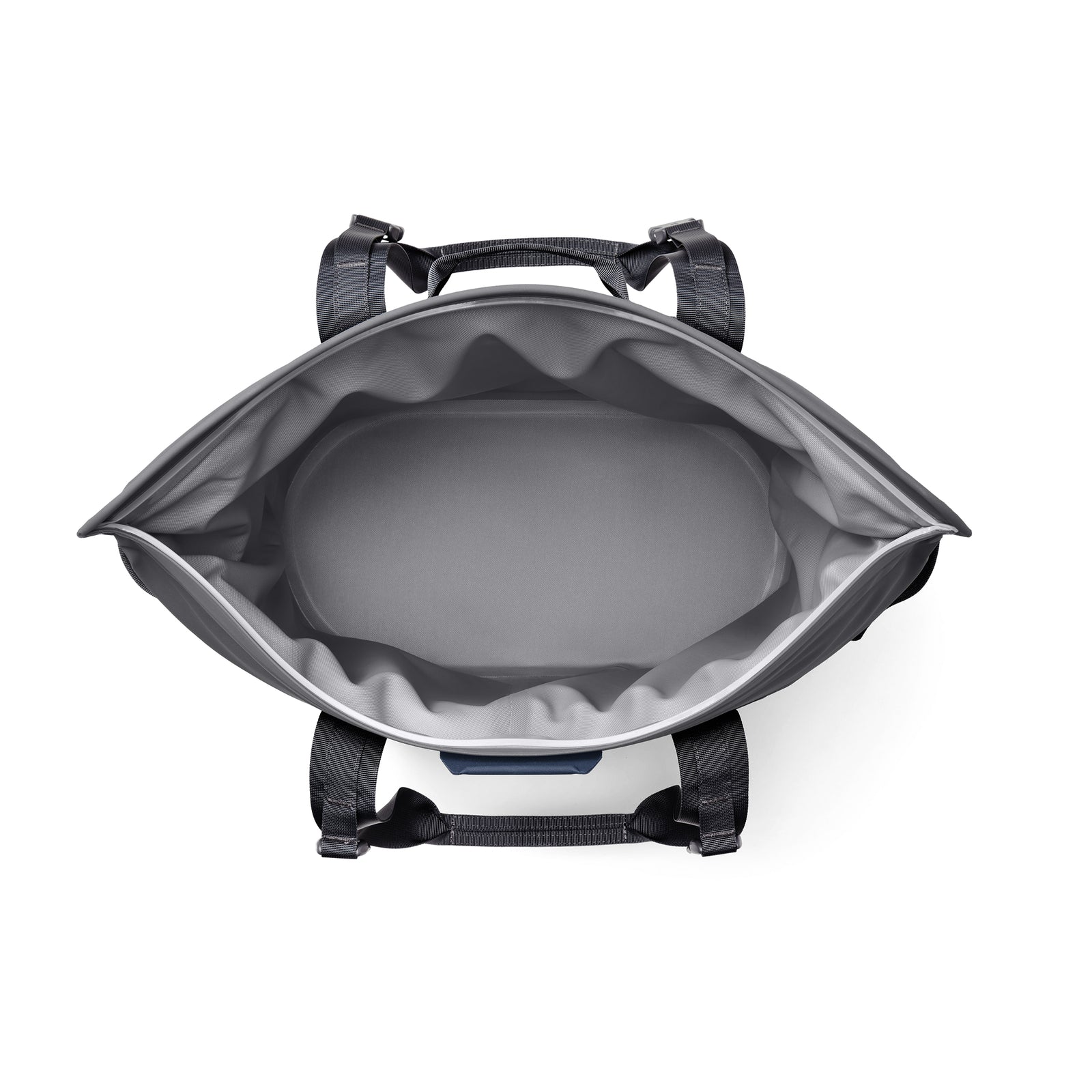 Draufsicht auf die geöffnete, leere YETI® Hopper M30 Soft Cooler - Navy, mit schwarzen Gurten und Griffen, die den geräumigen Innenraum, das helle Innenfutter und den MagShield Access hervorheben. Die YETI-Kühlbox steht vor einem weißen Hintergrund.