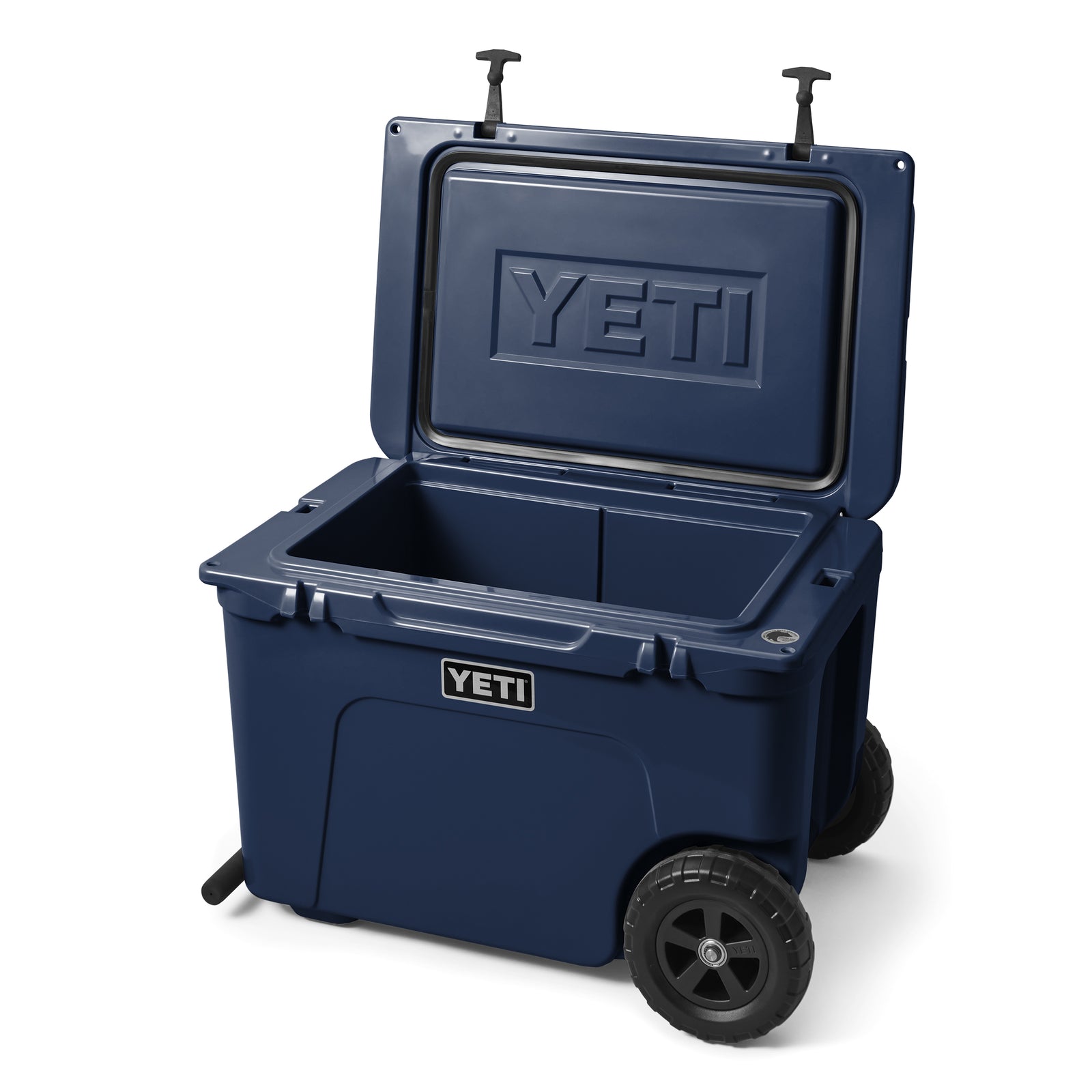 Die YETI® Kühlbox Tundra Haul - Navy verfügt über stabile All-Terrain-Räder, T-Griff-Verschlüsse und einen offenen Deckel - die ideale Outdoor-Kühlbox für jedes Abenteuer.