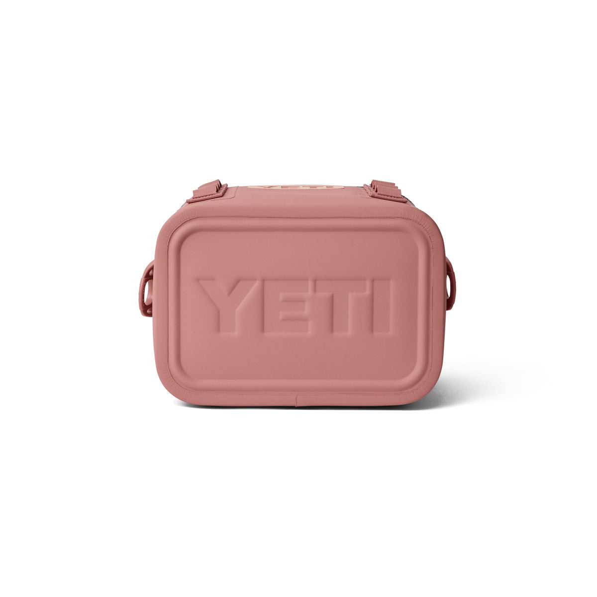 Die YETI® Kühltasche Hopper Flip® 8 in Sandstone Pink ist von vorne abgebildet und zeigt das geprägte YETI-Logo und zwei seitliche Griffe, die stilvolles Design mit robuster Funktionalität verbinden.