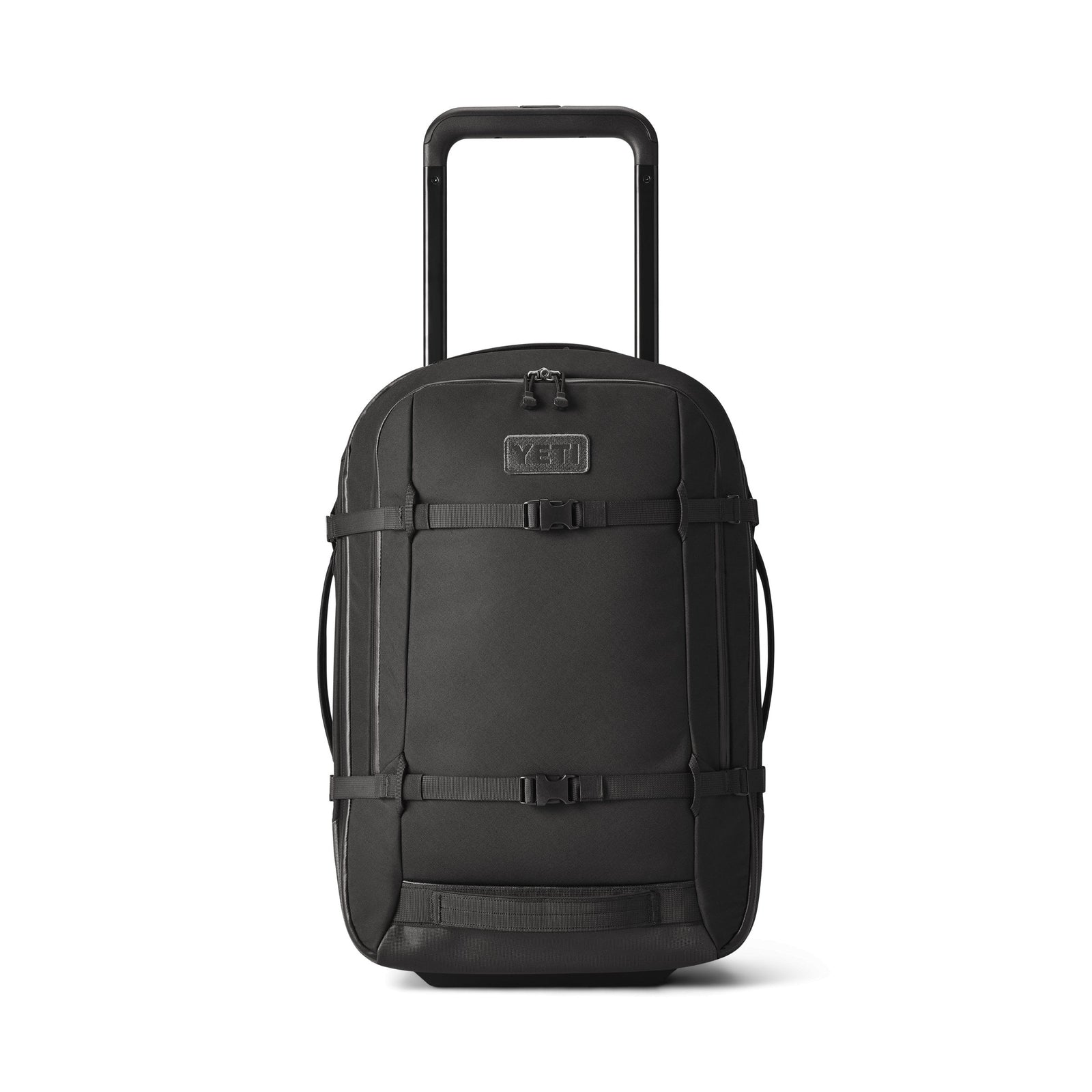 Der YETI® Koffer Crossroads® 22 in Schwarz von YETI ist ein Rollkoffer aus robustem TuffSkin-Nylon mit Teleskopgriff, Reißverschlusstasche vorne, seitlichen Griffen und stabilen Gurten, abgebildet auf einem schlichten weißen Hintergrund.