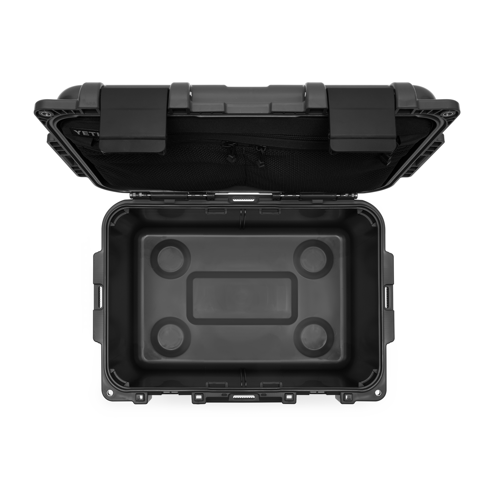 Die YETI® LoadOut GoBox 30 - Charcoal ist von oben geöffnet und leer dargestellt, mit einem aufklappbaren Deckel, einem mit Schaumstoff ausgekleideten Innenraum und vier kreisförmigen Vertiefungen im Boden - eine robuste 30-Liter-Transportbox von YETI auf weißem Hintergrund.
