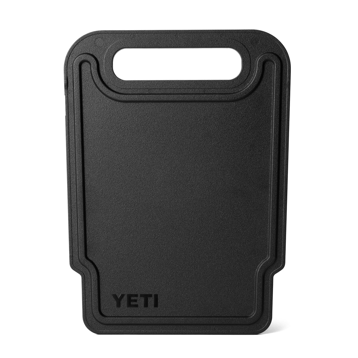 Eine schwarze rechteckige YETI® Roadie 32 Trennwand mit abgerundeten Kanten, einem Griff oben und dem YETI-Logo unten links - ideal als Roadie-Zubehör oder zur Verwendung mit Ihrer Kühlbox.