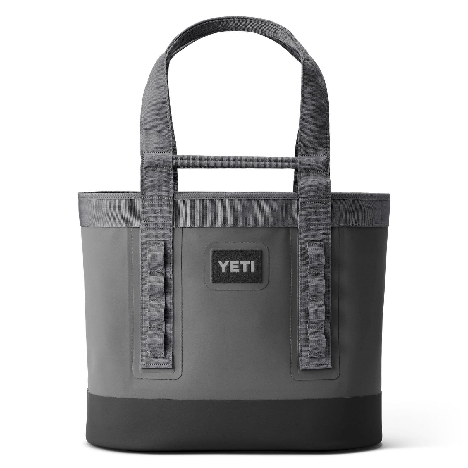Die YETI® Tragetasche Camino® Carryall 50 in Storm Grey verfügt über robuste Doppelgriffe, eine rechteckige Form, einen schwarzen Boden und das YETI-Logo - ideal für den Transport von Ausrüstung, wo immer Sie hingehen.